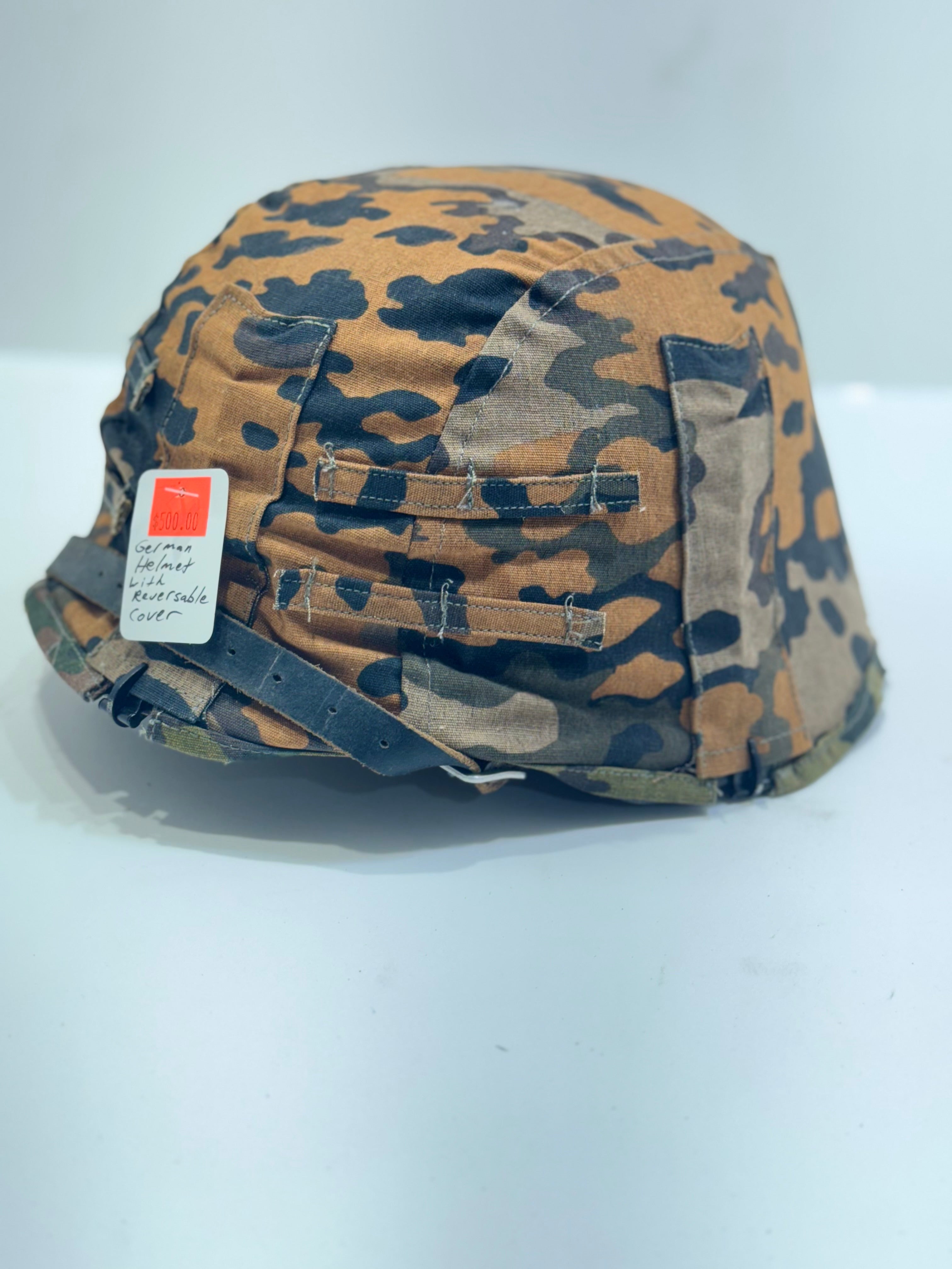 Vintage German helmet with reversible cover